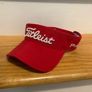 Women’s red Titleist visor